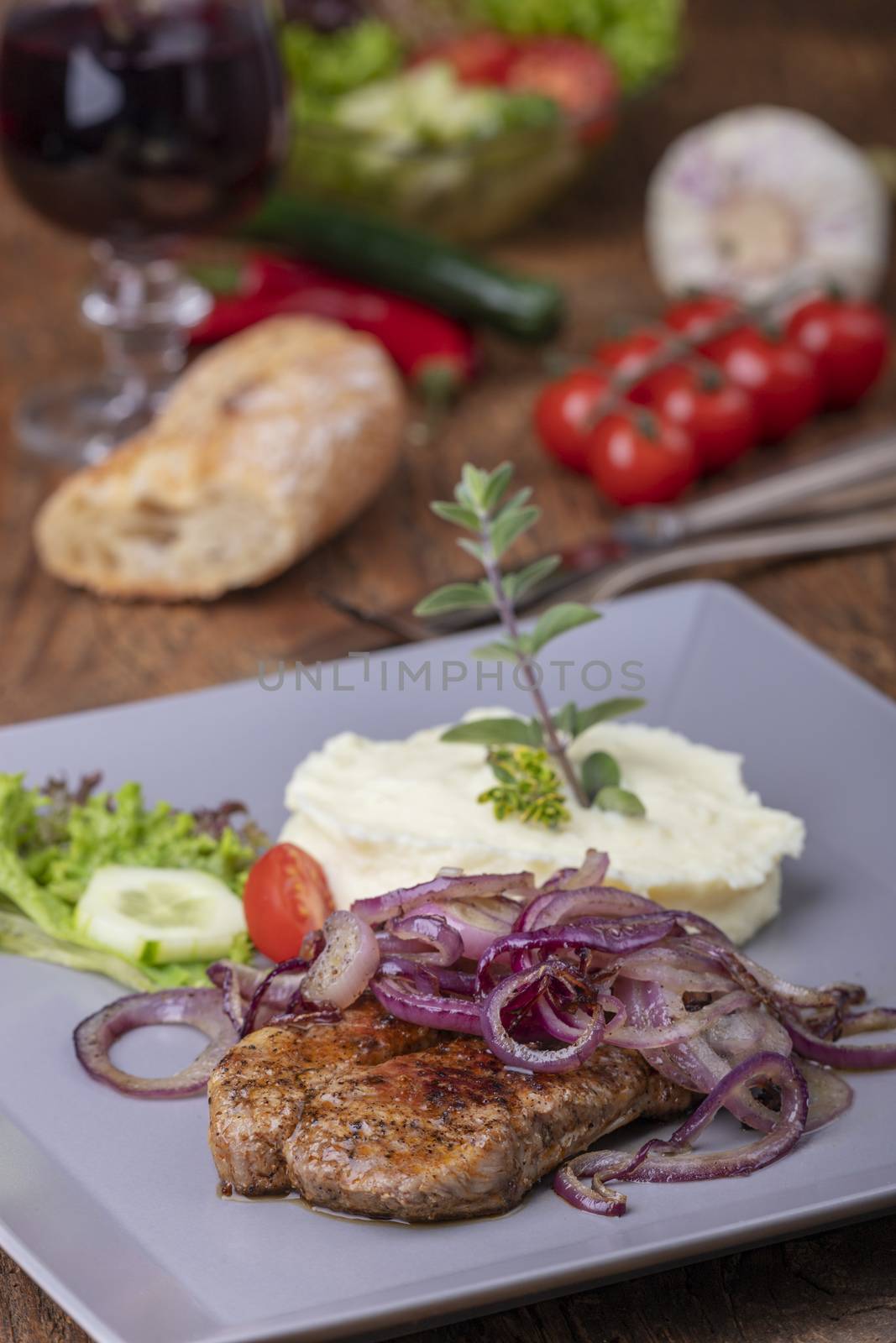 grilled pork steak with onions by bernjuer