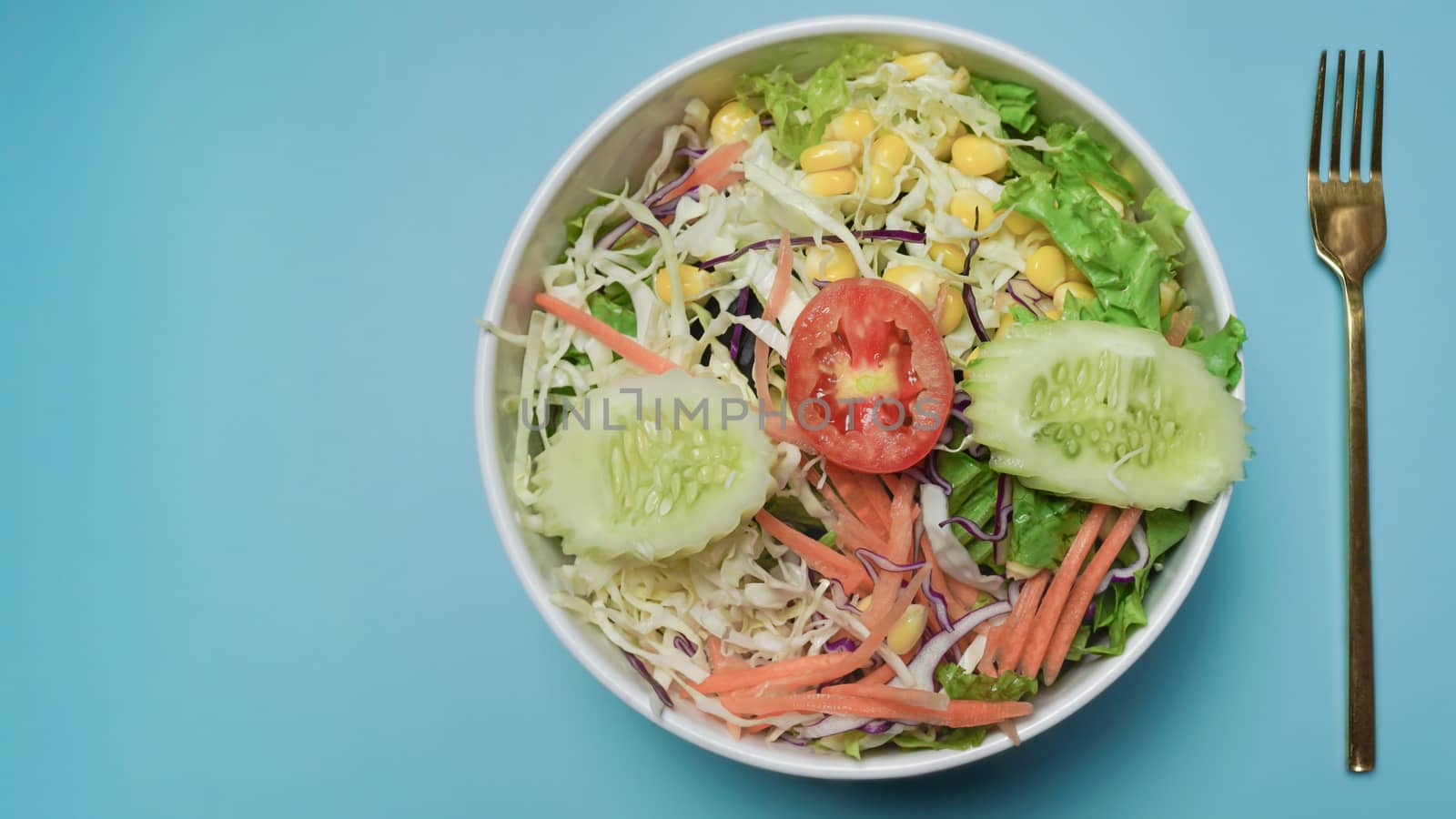 Fresh colorful vegetables salad bowl.