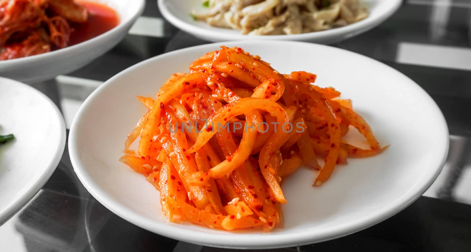 Korean side dish made from papaya kimchi.