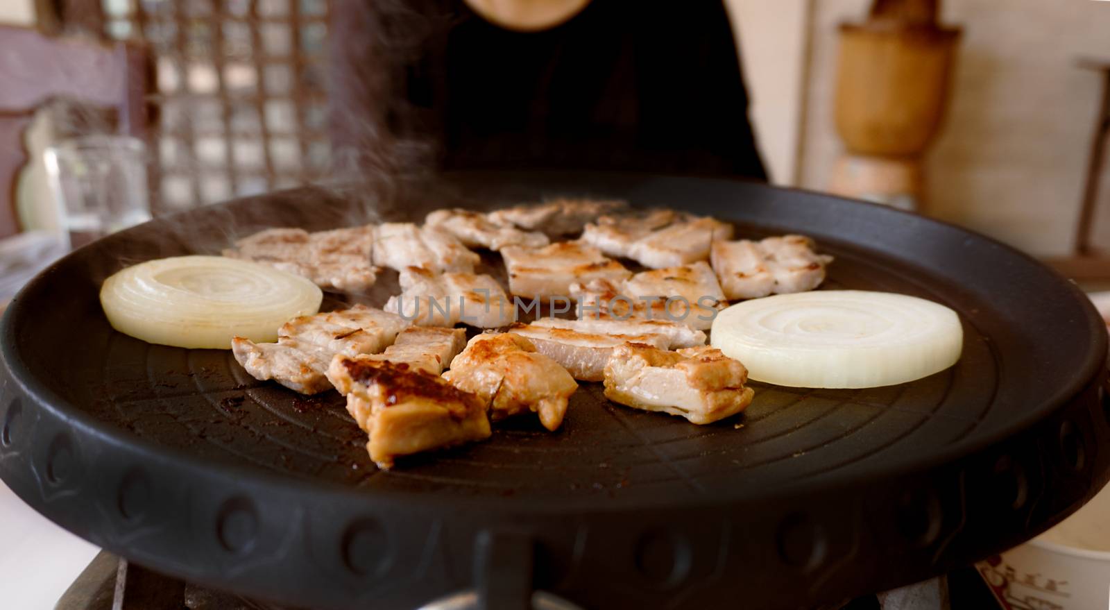 Korean BBQ grilled on pan.