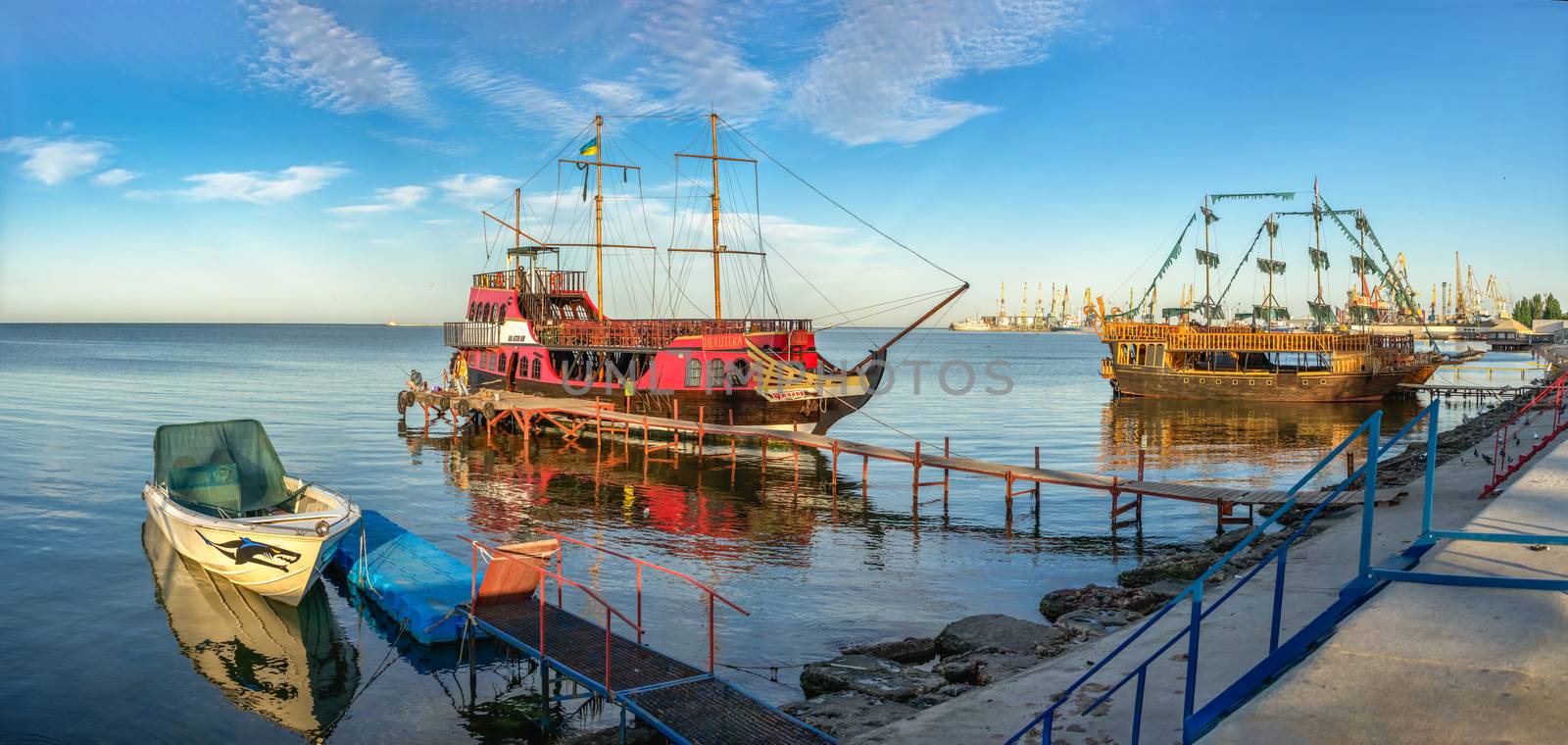 Berdyansk, Ukraine 07.23.2020. Pleasure boats on the embankment of the Azov Sea in Berdyansk, Ukraine, in an early summer morning