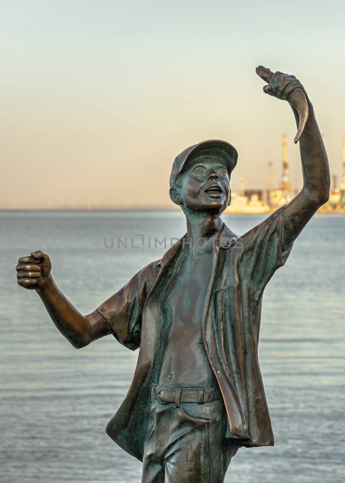 Monument to the fisherman on the embankment of Berdyansk, Ukrain by Multipedia