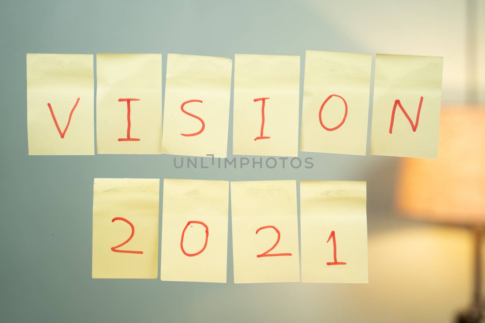 Pasted vision 2021 on wall - Concept for new year 2021 vision or business plan