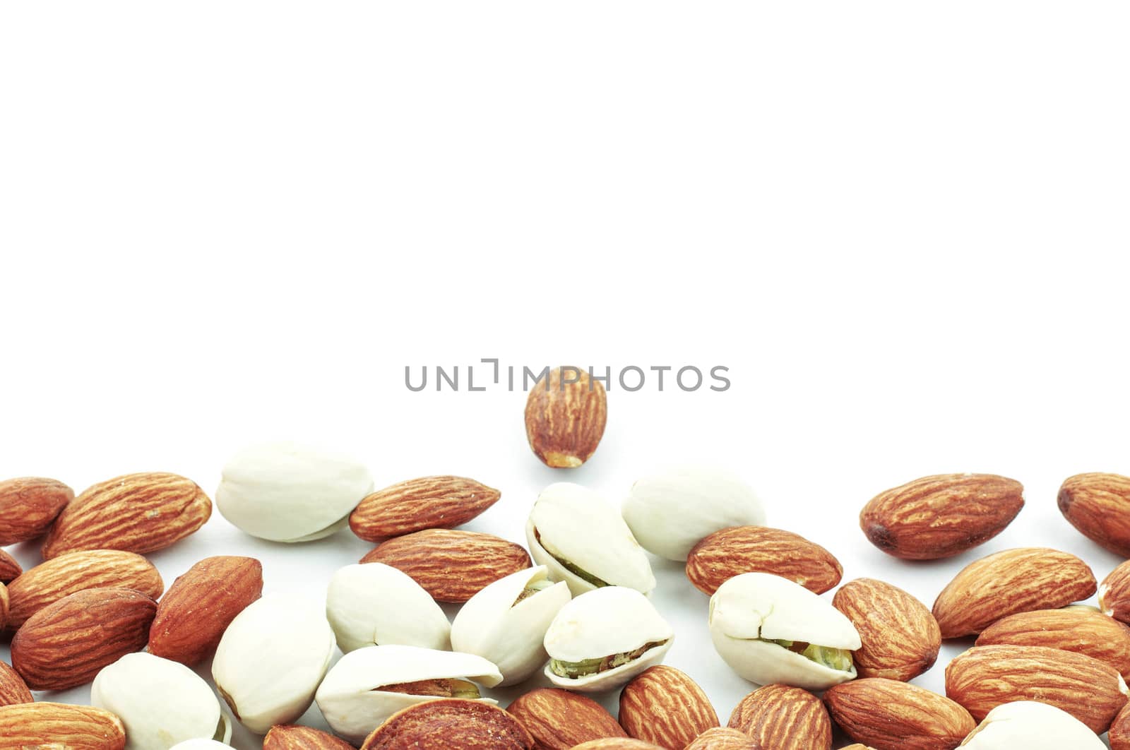 Almond mixed on a white background.