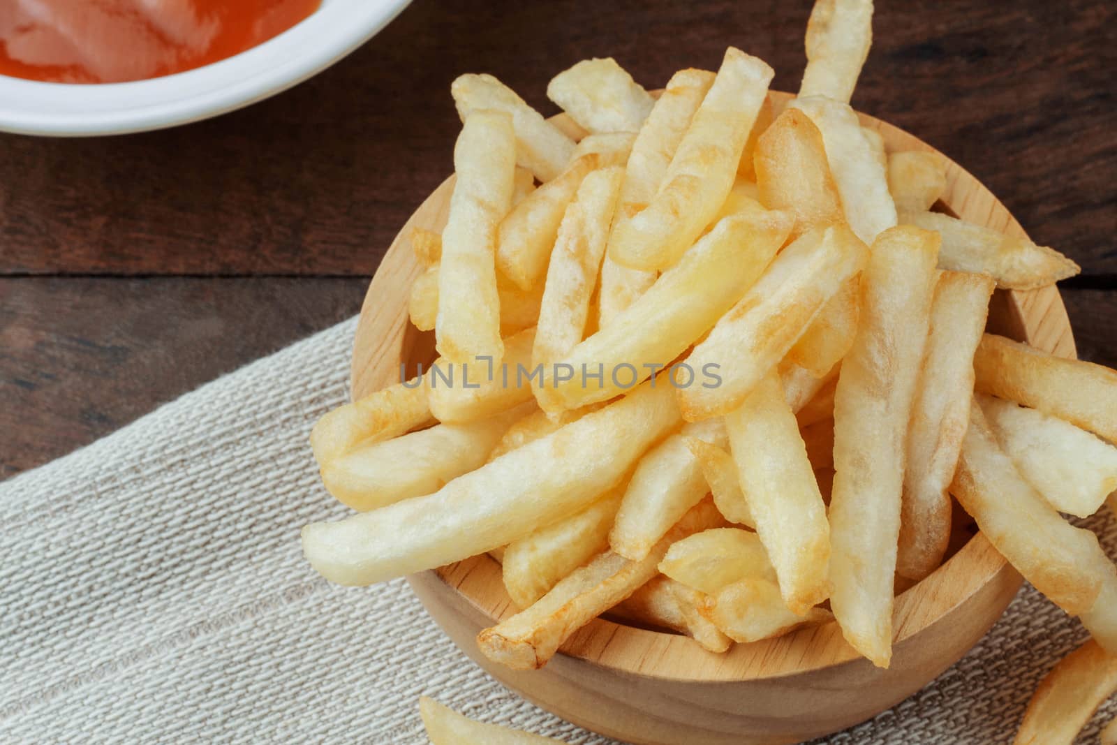 French fries on wooden. by start08