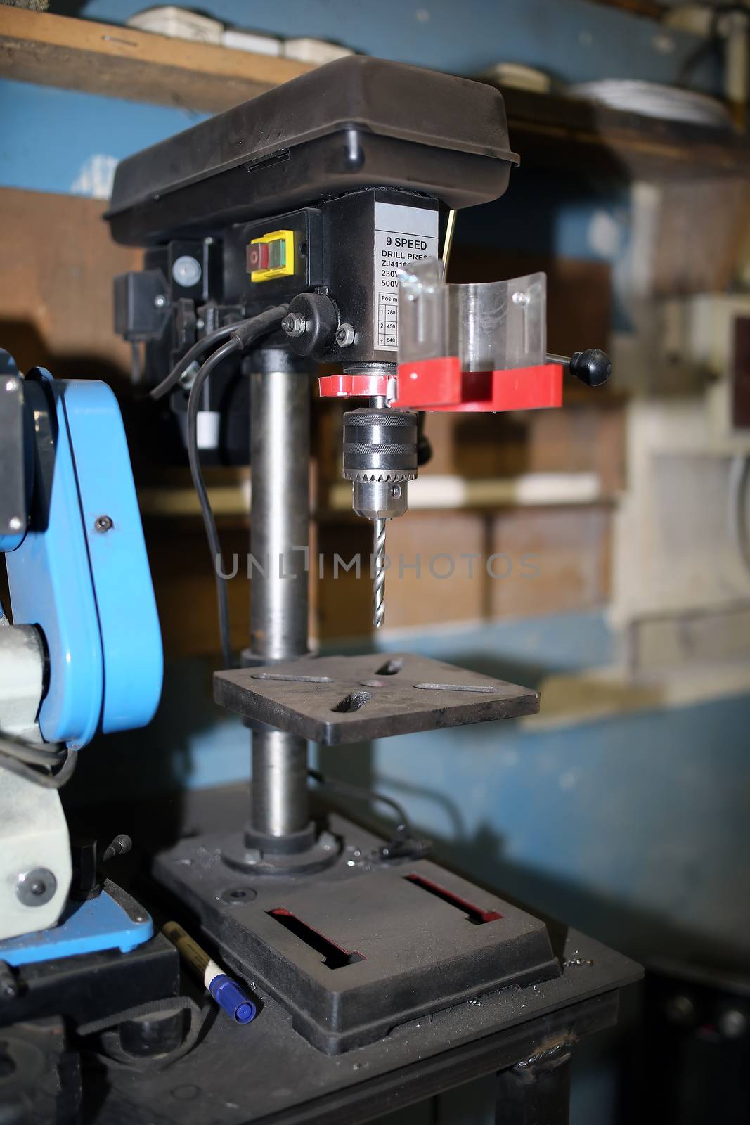 Drilling machine with a drill inserted. Metal drilling by 977_ReX_977