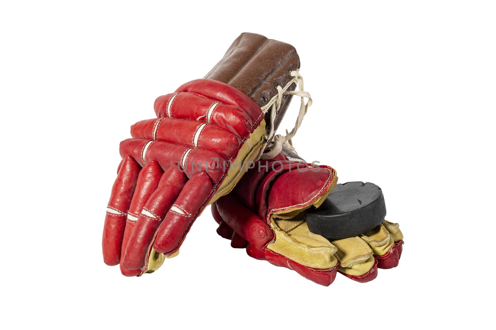 Old red hockey gloves for goalkeeper. Isolated over white background by 977_ReX_977