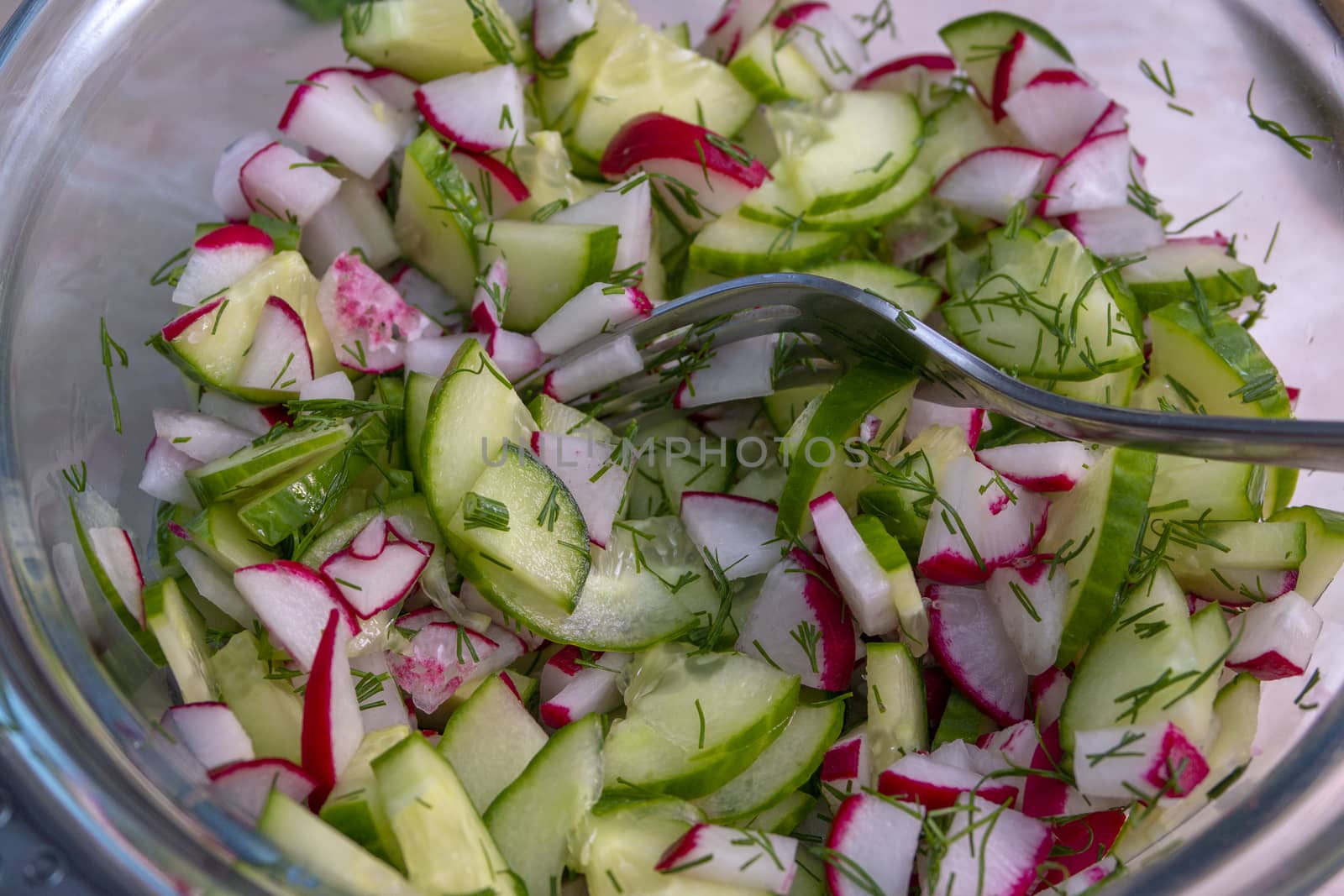 healthy eating. Vegetables. Juicy radish and cucumber salad with dill