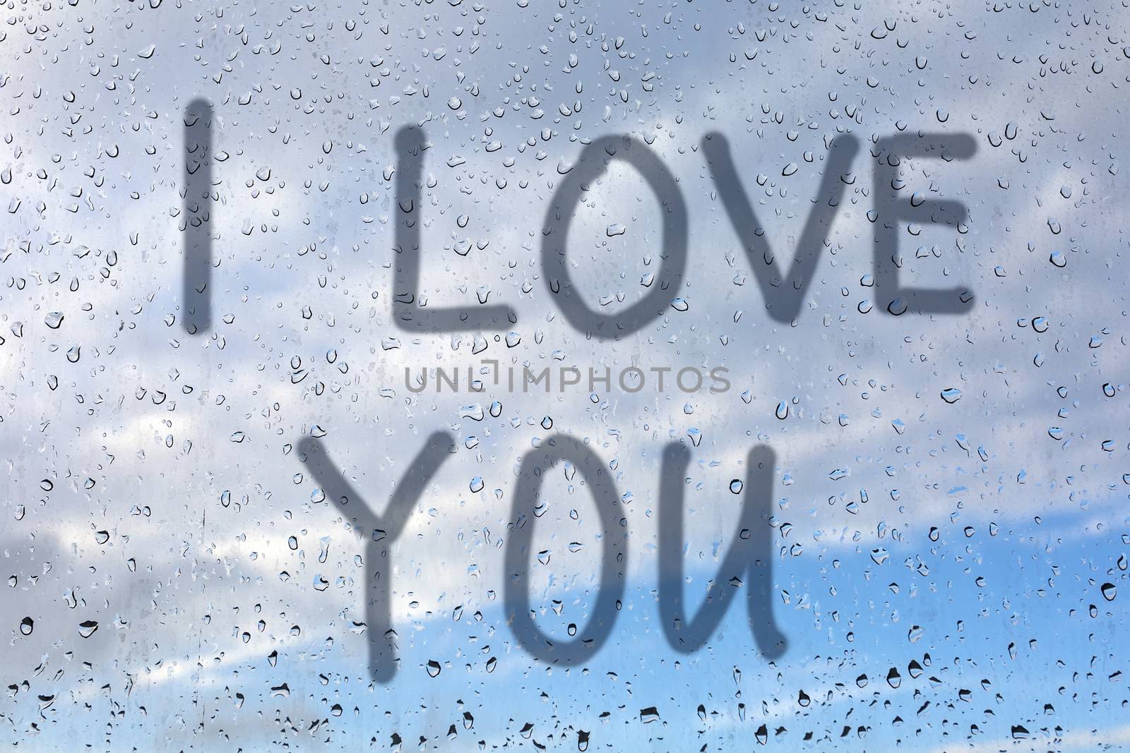 Writing i love you on steamy window. Valentine's day background by 977_ReX_977