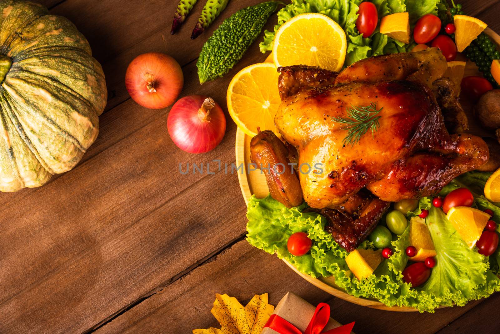 Thanksgiving roasted turkey or chicken and vegetables, Top view Christmas dinner feast food decoration traditional homemade on wooden table background, Happy thanksgiving day of holiday concept