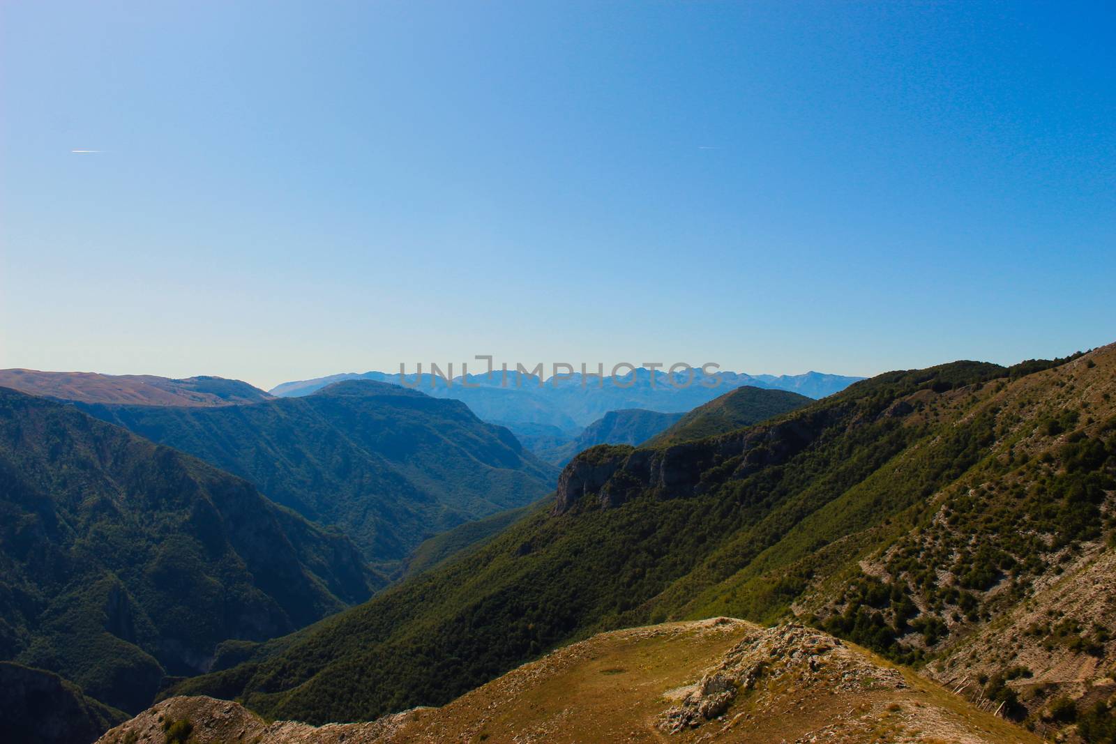 Many mountain peaks and hills observed above the old Bosnian village of Lukomir. Mountain peaks and hills. Bjelasnica Mountain, Bosnia and Herzegovina.