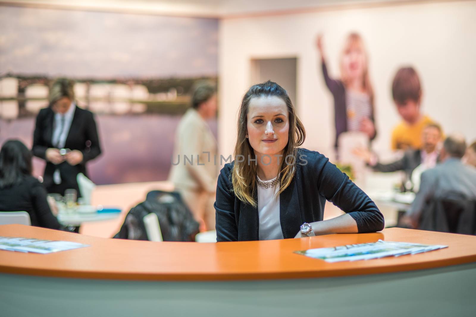 Woman welcoming people at the convention trade center in Brno. BVV Brno Exhibition center. Czech Republic