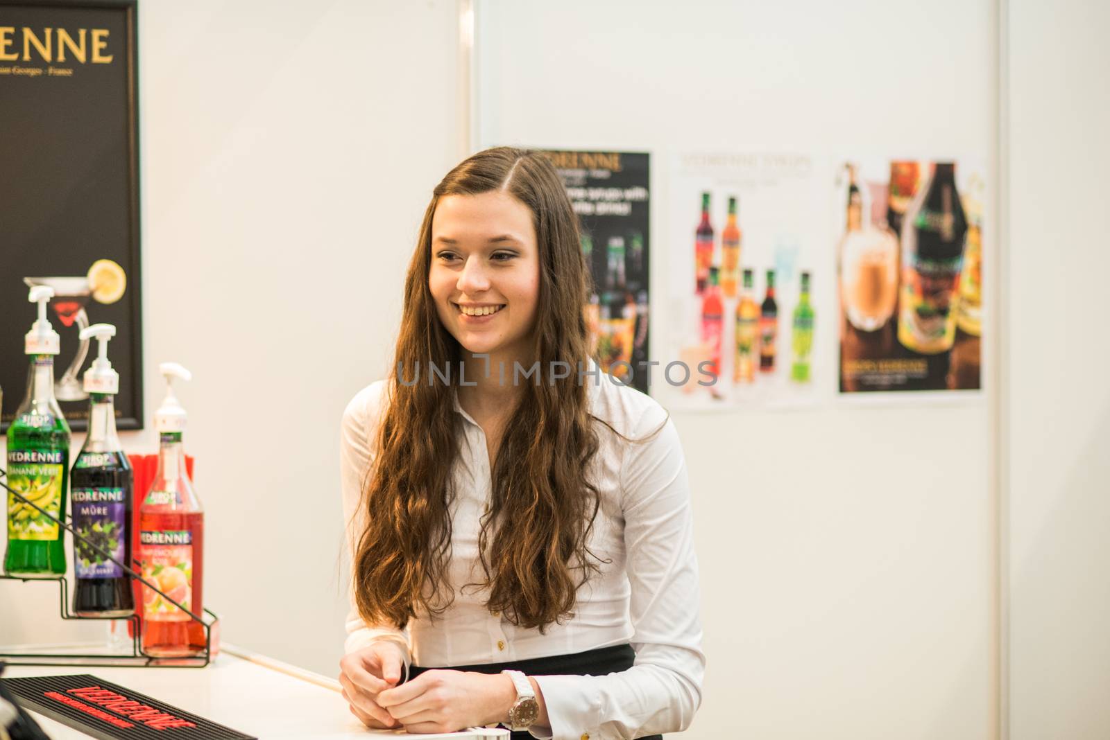 One women smiling while working at the convention trade center in Brno. BVV Brno Exhibition center. Czech Republic