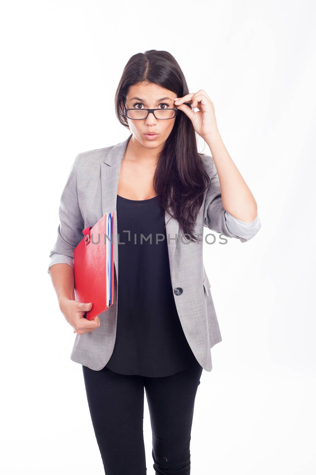 beautiful young business woman who is surprised with a red folder