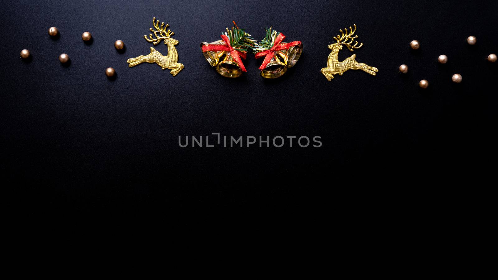 Christmas background. Top view of Christmas decorations on black background with copy space for text. Flat lay, winter, postcard template, new year concept.
