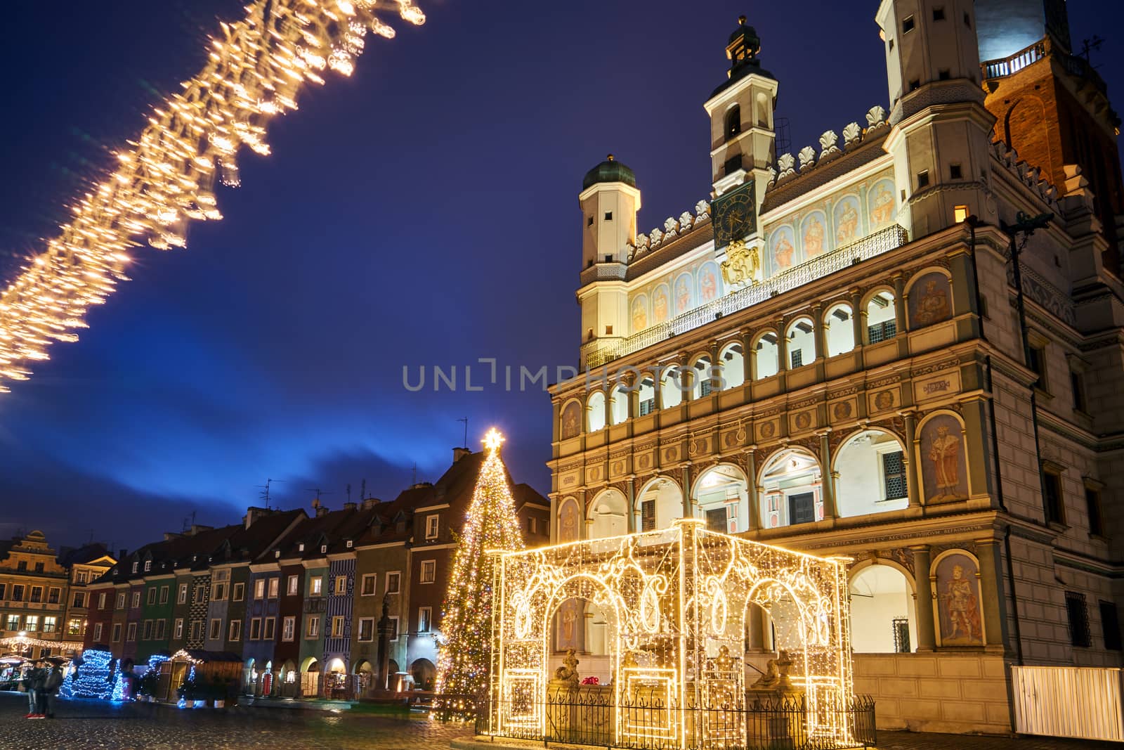 the facade of Renaissance town hall and christmas decorations in city of Poznan