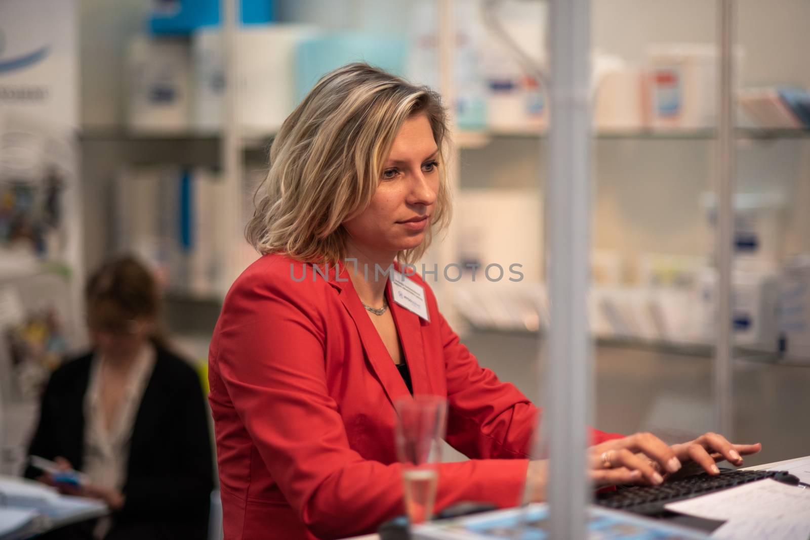 20/05/2018. Brno, Czech Republic. Woman working with her computer while attending an event at the convention trade center in Brno. BVV Brno Exhibition center. Czech Republic by gonzalobell