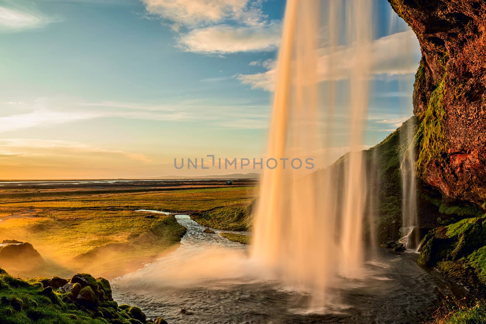 Seljalandsfoss waterfall at sunset in summertime, Iceland