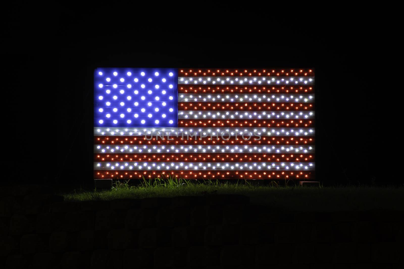 Photography of a LED lit up structure displaying the US flag