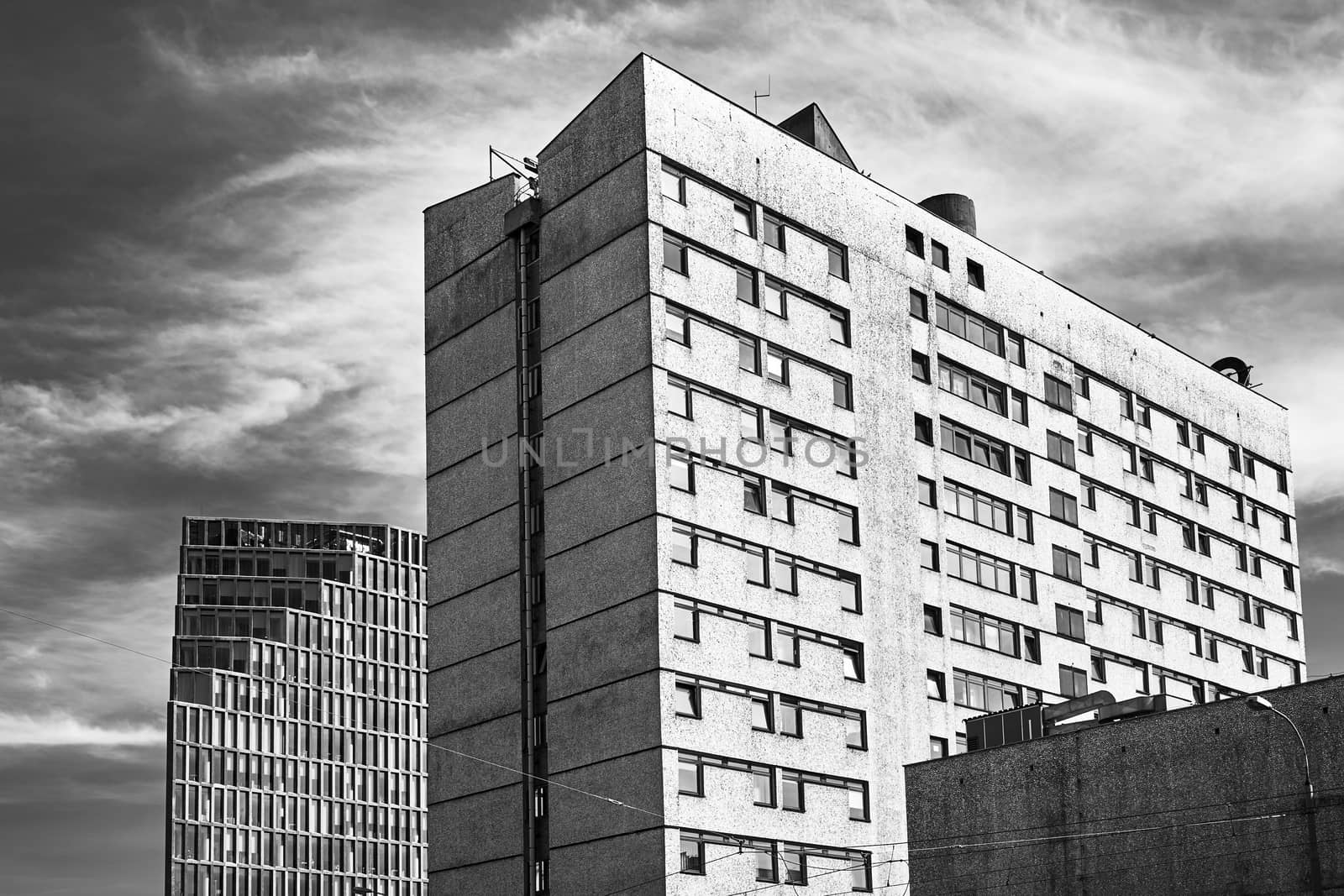 Concrete and glass facades of modern buildings in Poznan city, monochrome