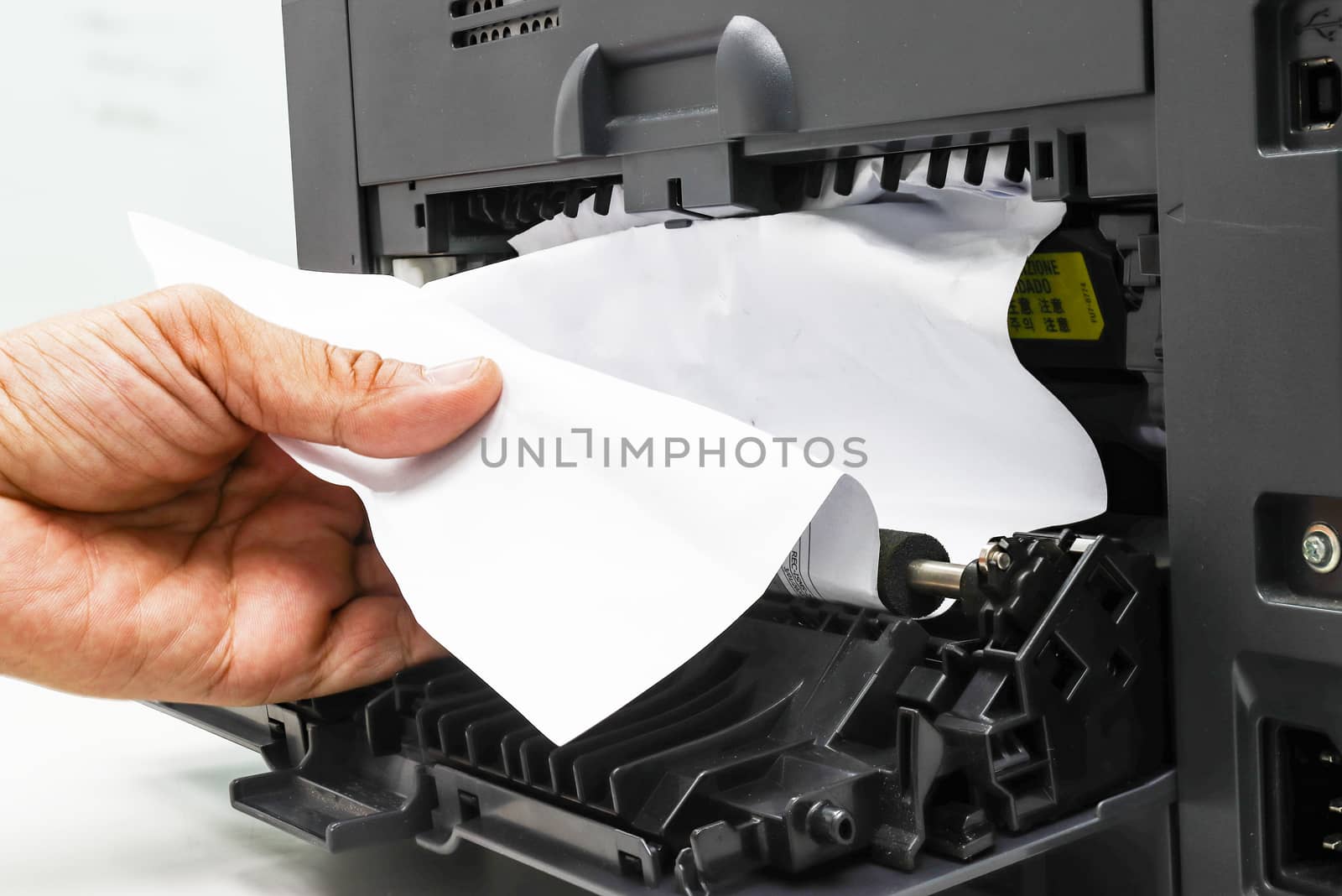 Technicians Removing Paper Stuck, Paper Jam In Printer At Office