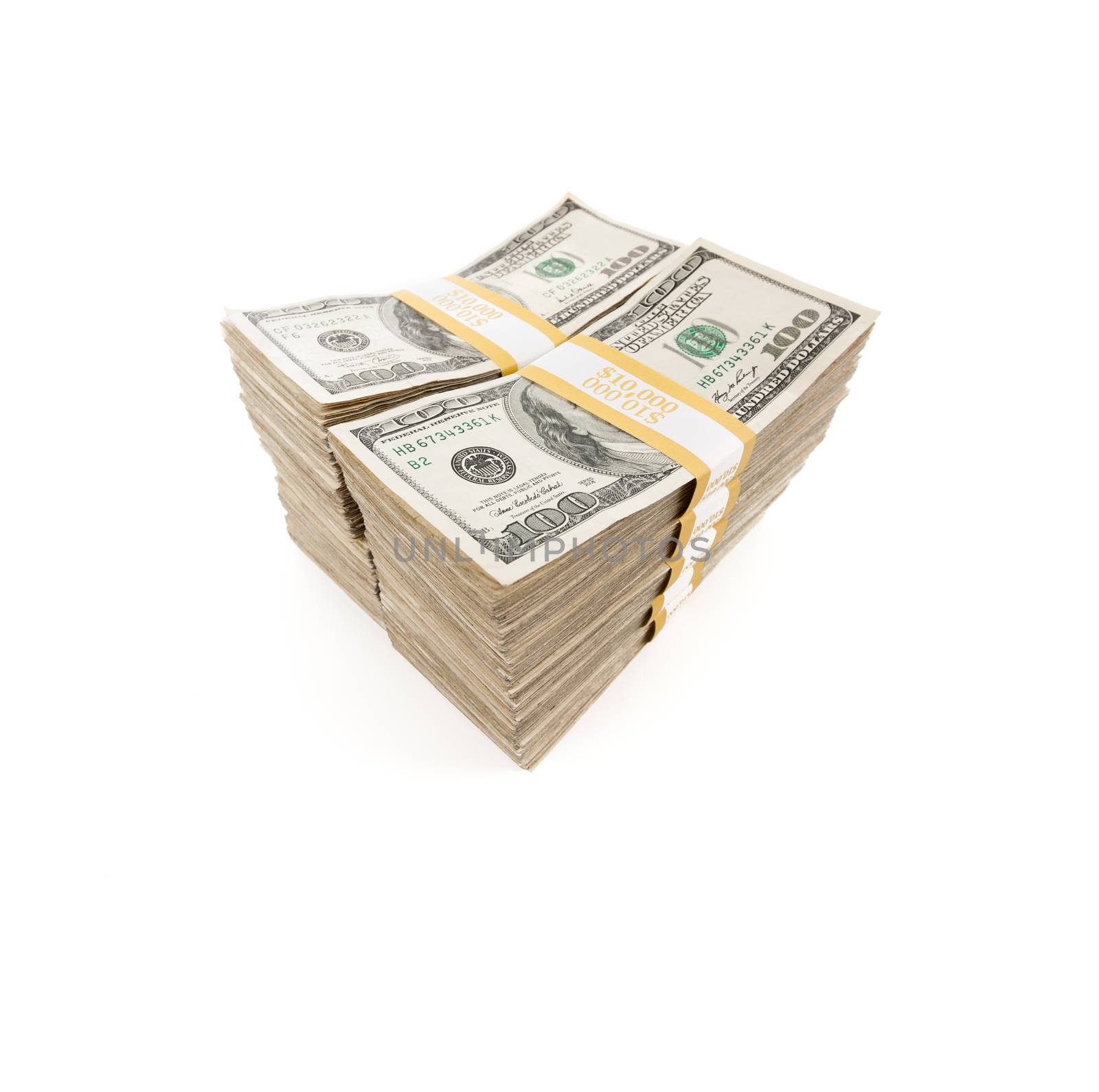 Stacks of One Hundred Dollar Bills Isolated on a White Background.