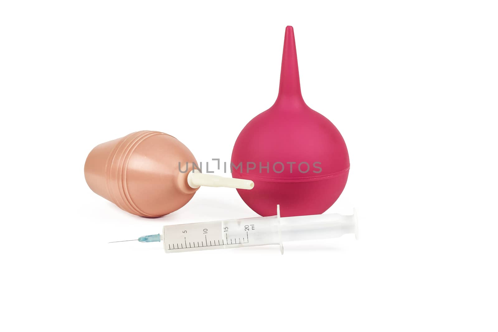 A medical syringe with a needle and two medical syringes