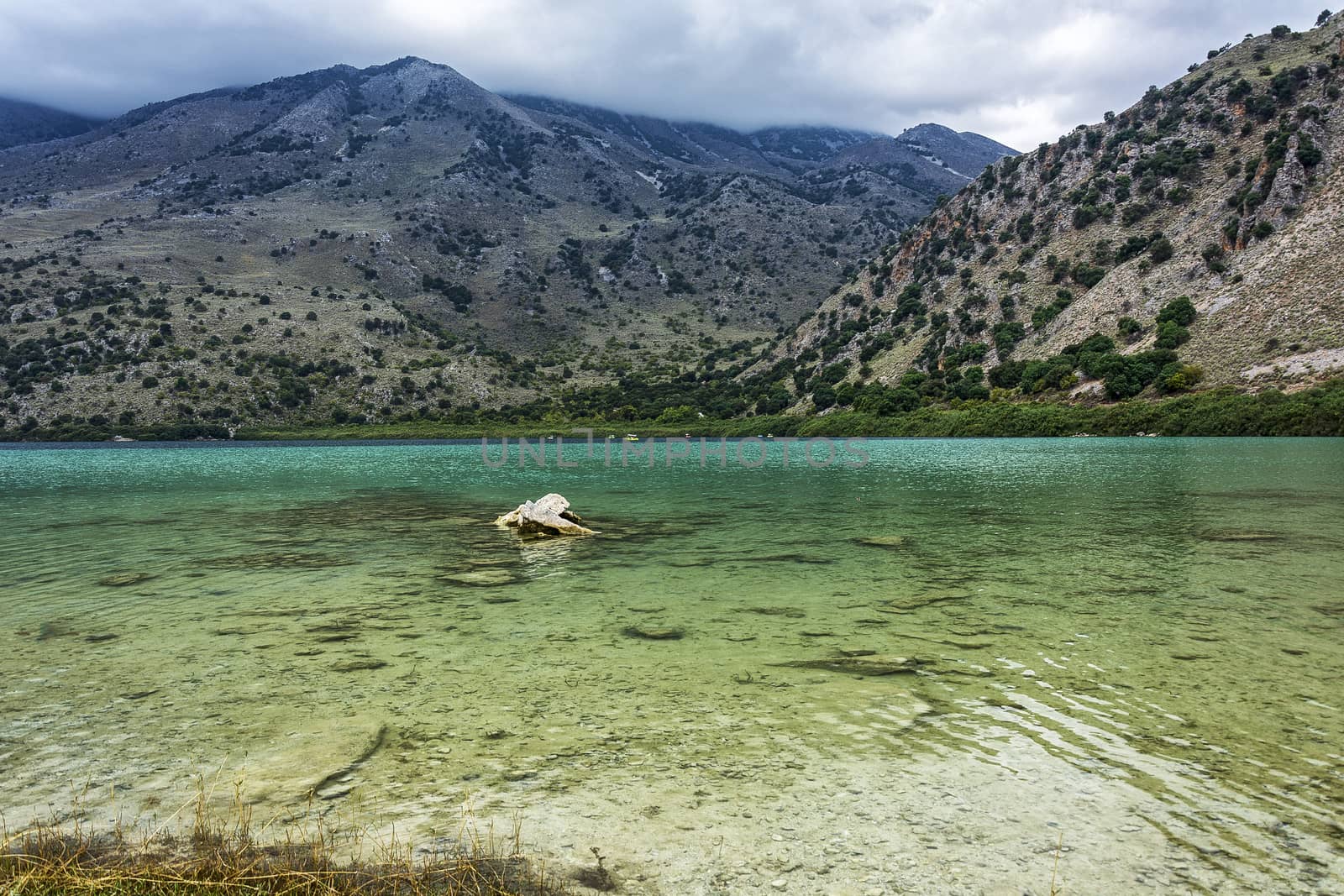 Shallow waters with clear turquoise waters of Lake Kournas (Crete, Greece)