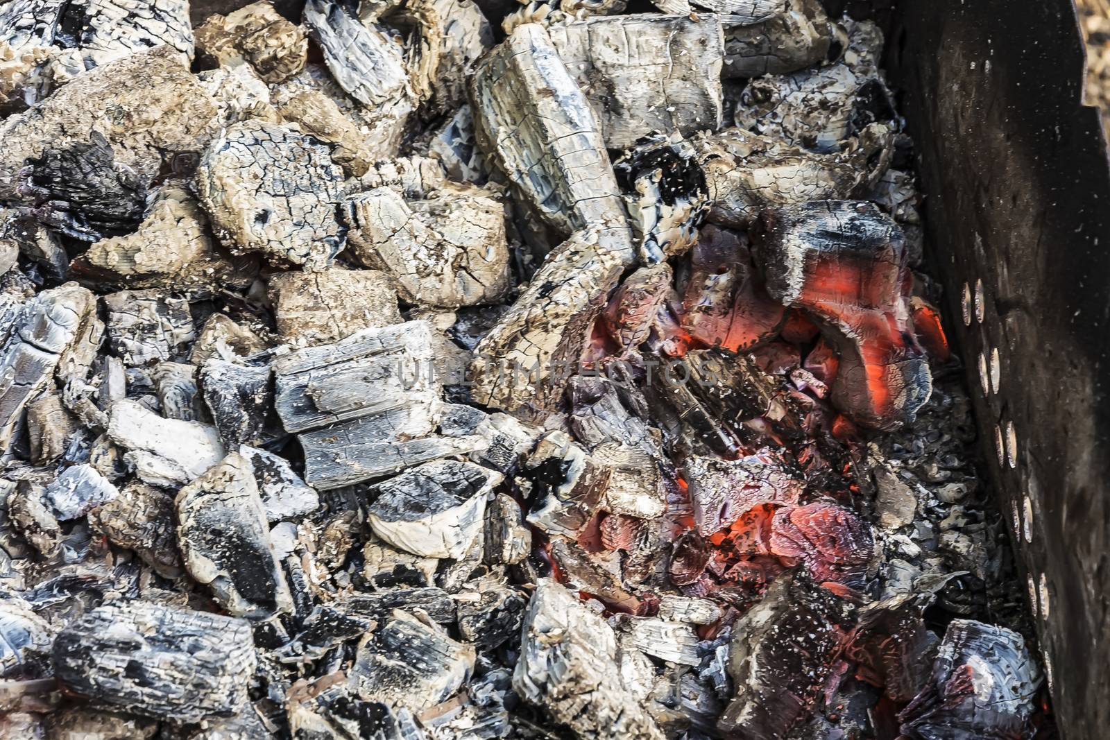 In the brazier smolder red red-hot charcoal