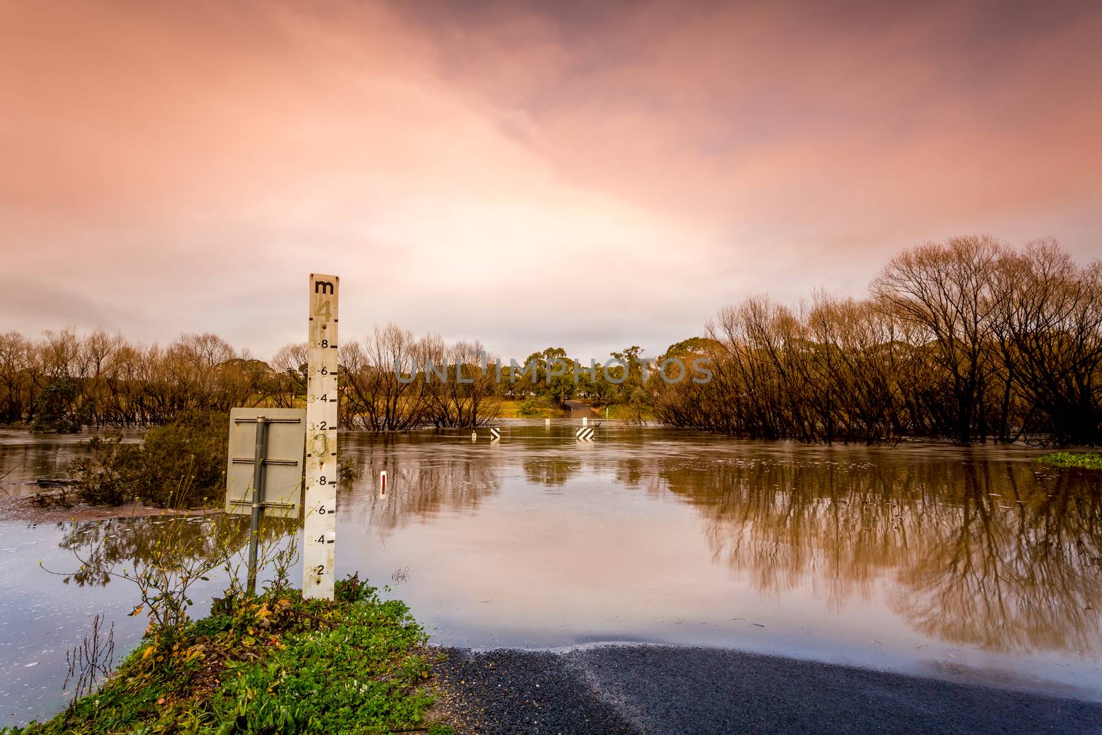 Road cut by flood waters of the Wollondilly River, the water level at 2 metres, but it rose to 4 metres in total and all signs were under water