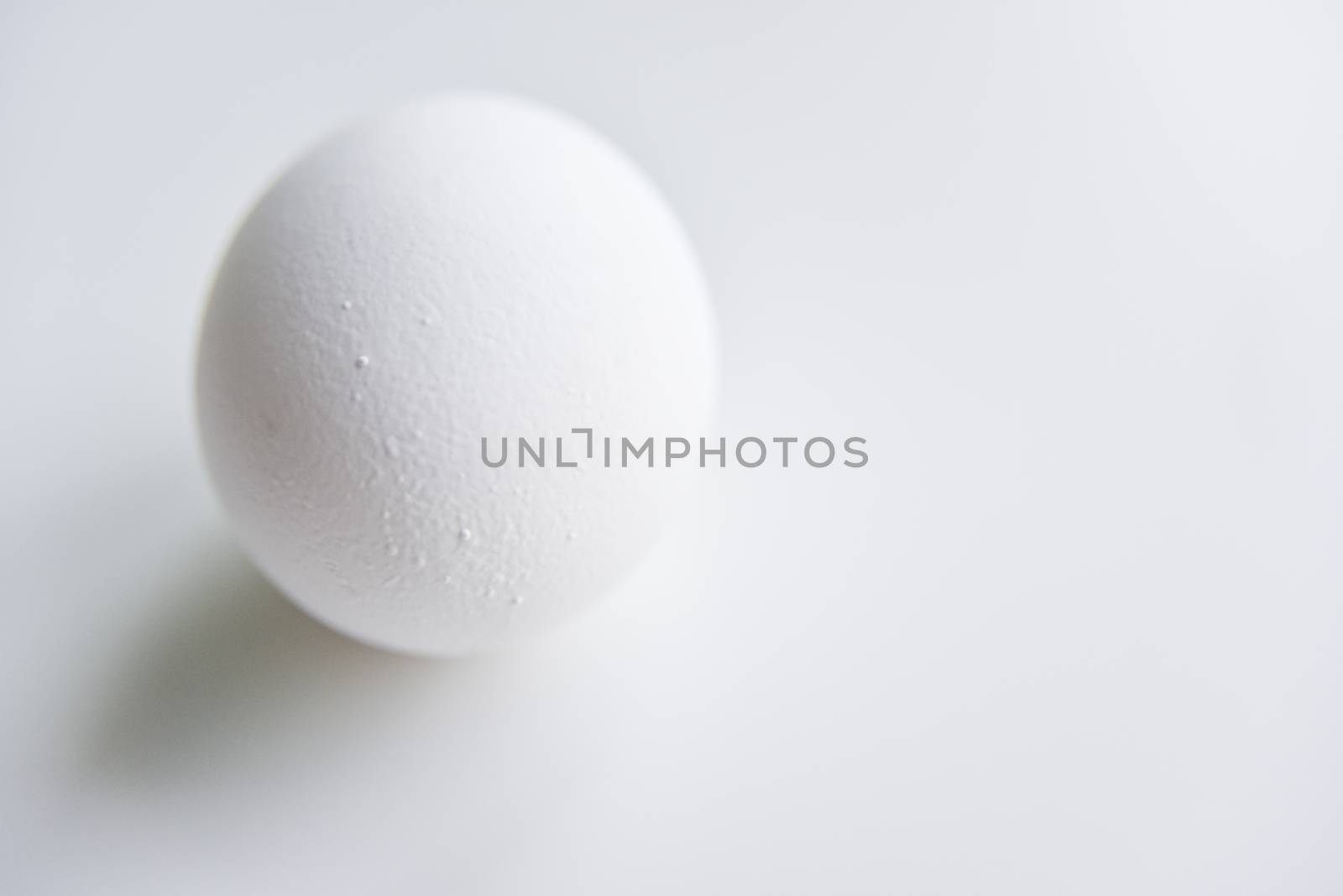 selective focus at the white egg on the white background