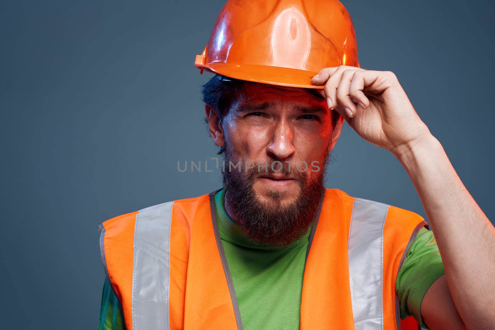 Emotional man in work uniform safety hard work lifestyle. High quality photo