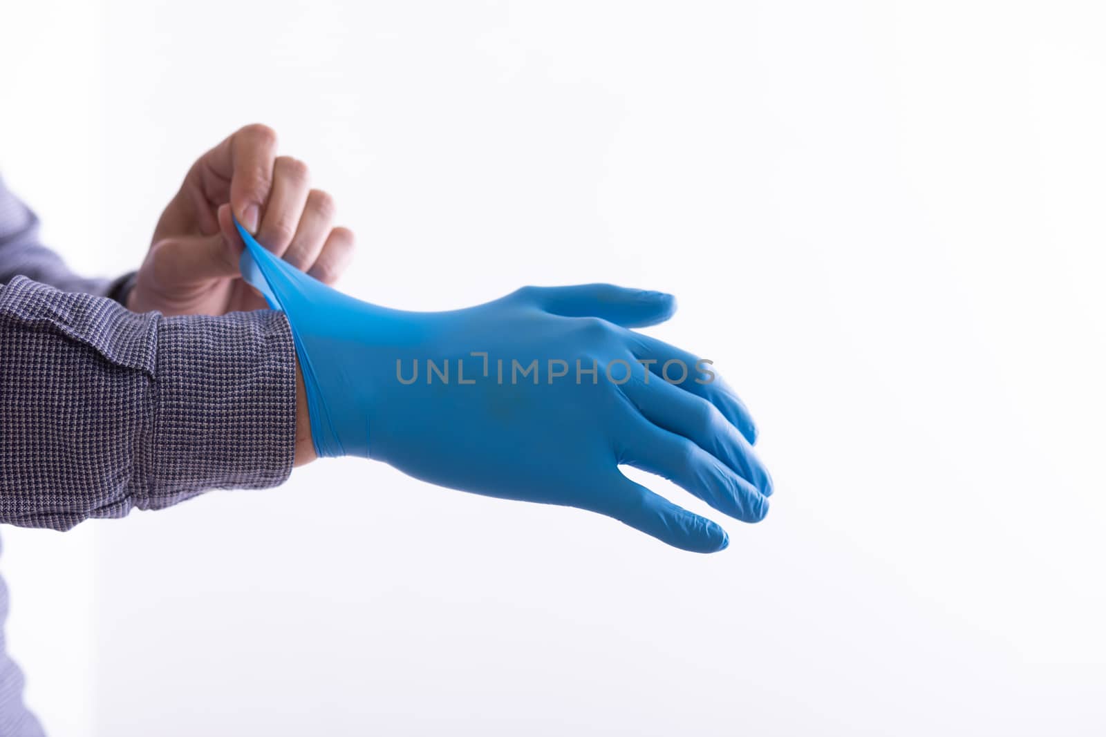 Man Wearing Gloves For Protection From Viruses by adamr