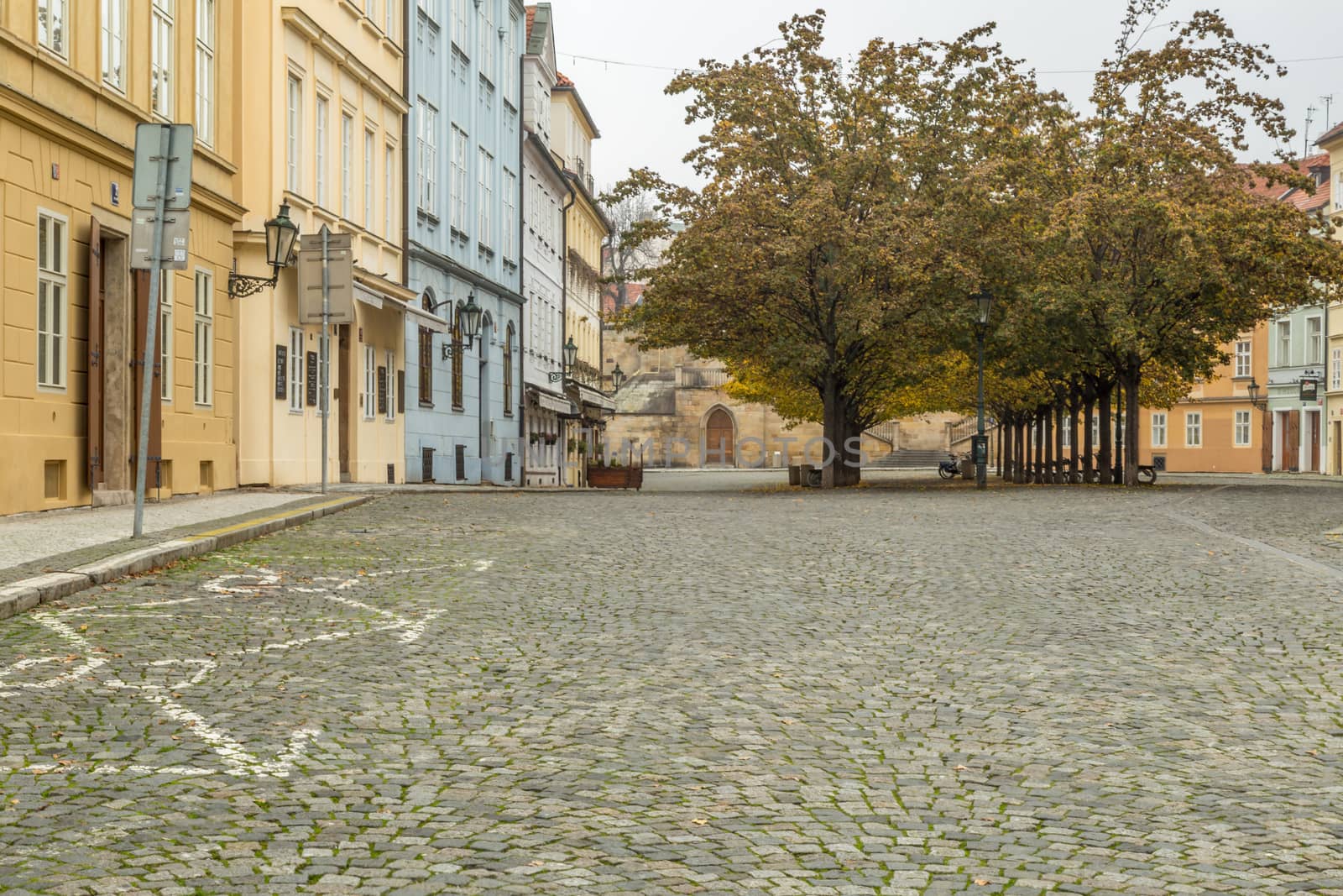 Autumn dawn in historic Prague at Charles Bridge over the Vltava River. Prague, ENESCO monument, Czech Republic