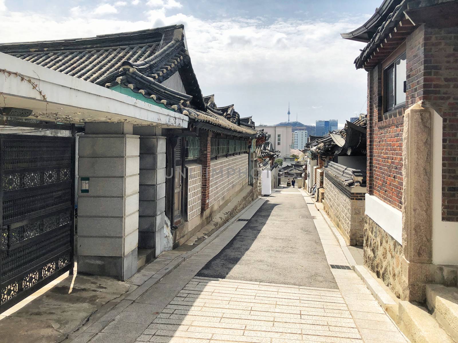 Bukchon Hanok Village And Seoul tower in daylight at Seoul, Sout by Surasak