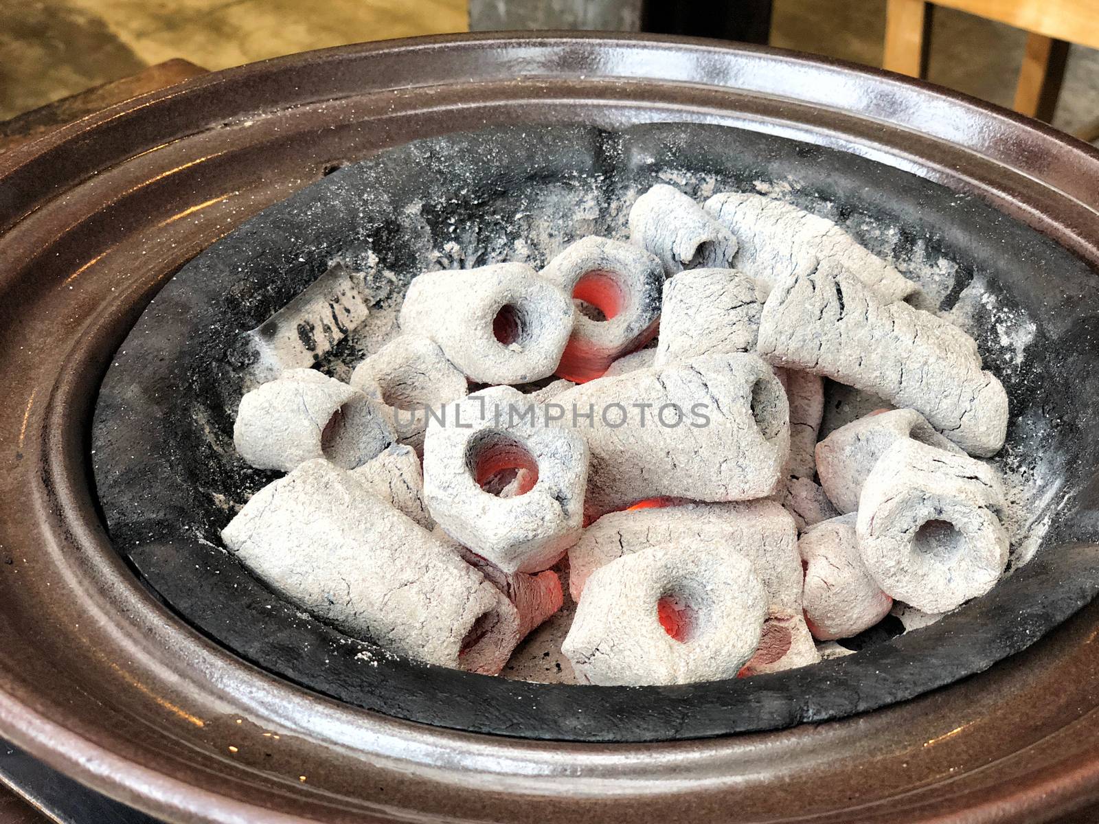 Close up and detail Coal stove for grill barbecue in restaurant by Surasak