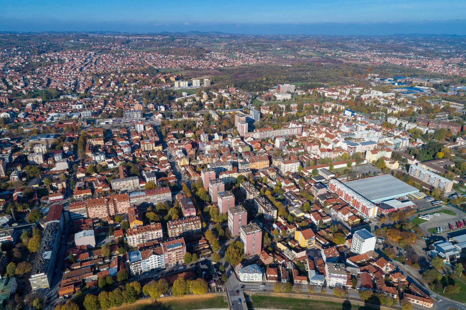 Valjevo - panorama of city center in Serbia. Aerial drone view  by adamr