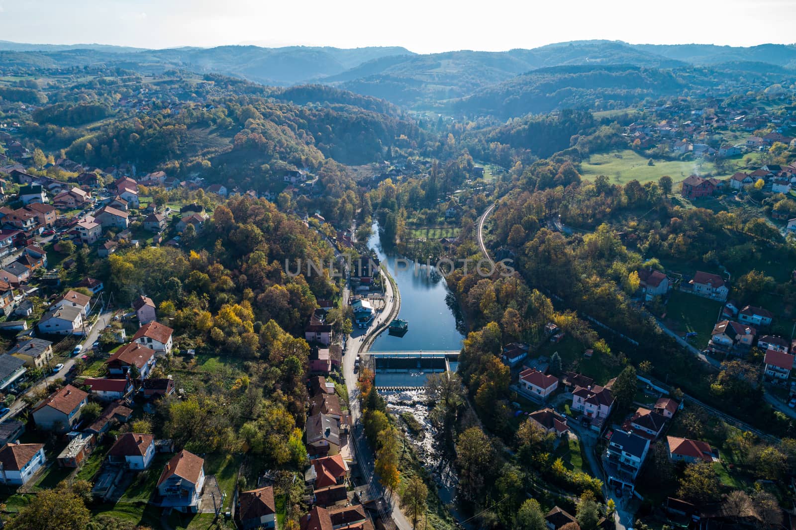 Dan on river Gradac in Valjevo - panorama of city in Serbia. Aerial drone view administrative center of the Kolubara District in Western Serbia