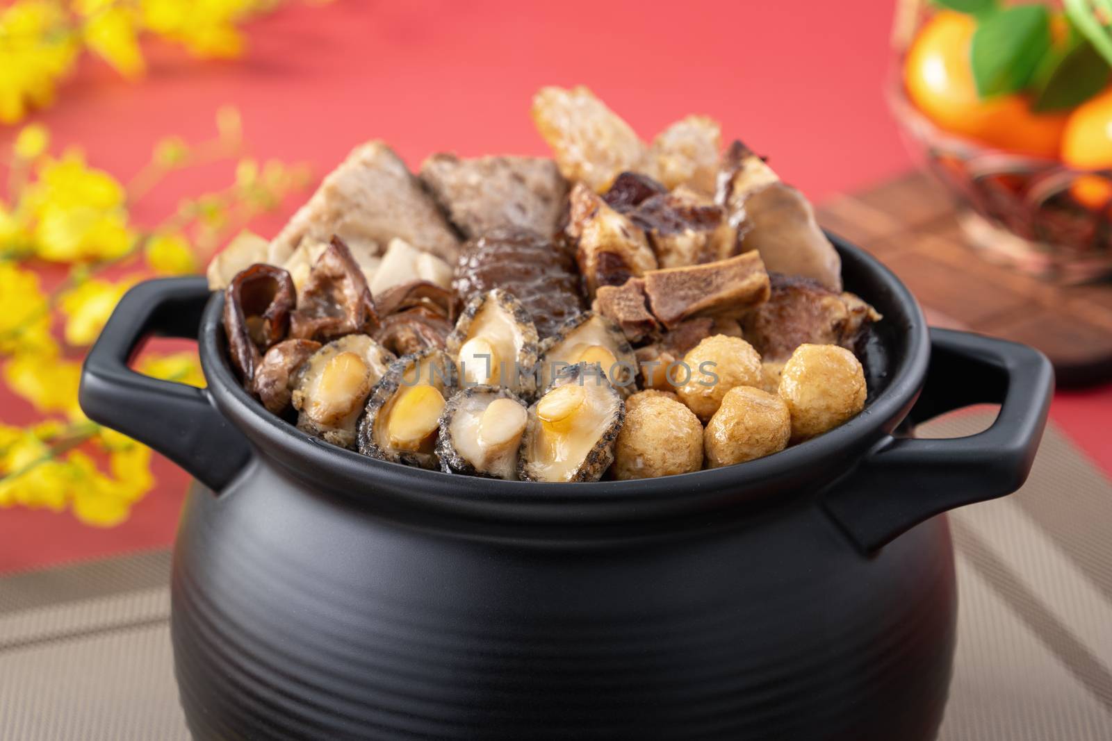 Traditional food of Chinese lunar new year, Buddha jumps over the wall, Chinese Soup Casserole dish, Buddha's Temptation, named Fo Tiao Qiang, close up.