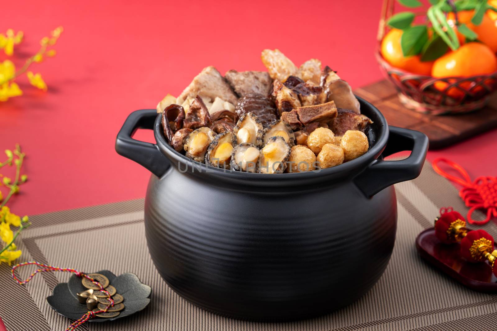 Traditional food of Chinese lunar new year, Buddha jumps over the wall, Chinese Soup Casserole dish, Buddha's Temptation, named Fo Tiao Qiang, close up.