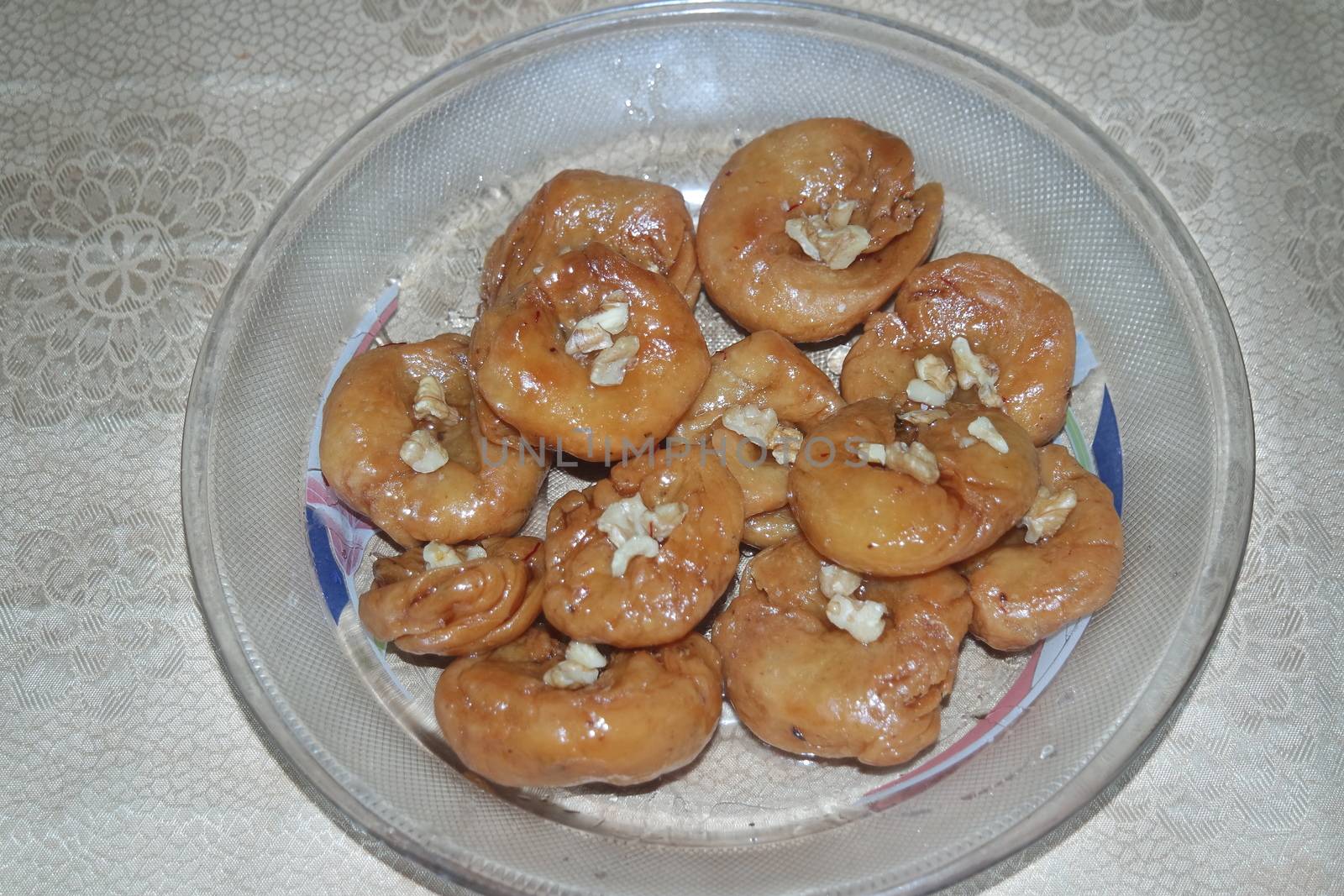 Closeup of delicious and tasty Asian sweet dish called balu shahi or baloshahi or balushahi. This dish is street sweet found in Pakistan India and Bangladesh and served in the festivities.