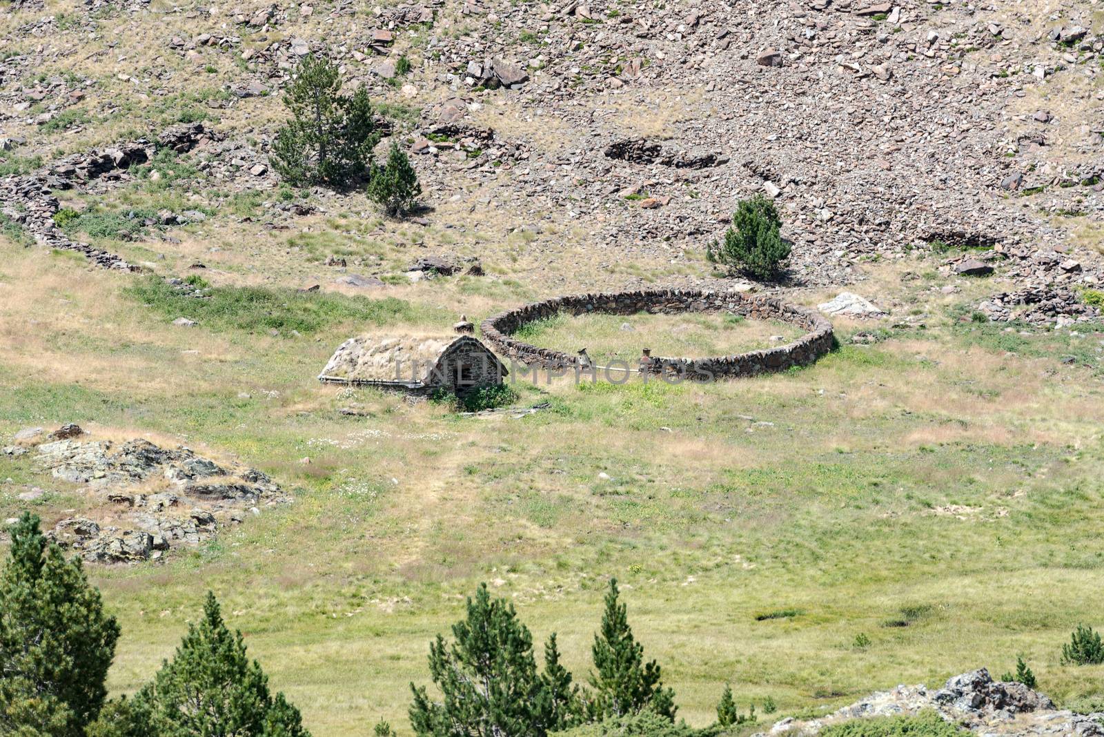 GR 11 signal in Coma Pedrosa Refuge at 2266 meters of altitude in Andorra Pyrenees in summer 2020.