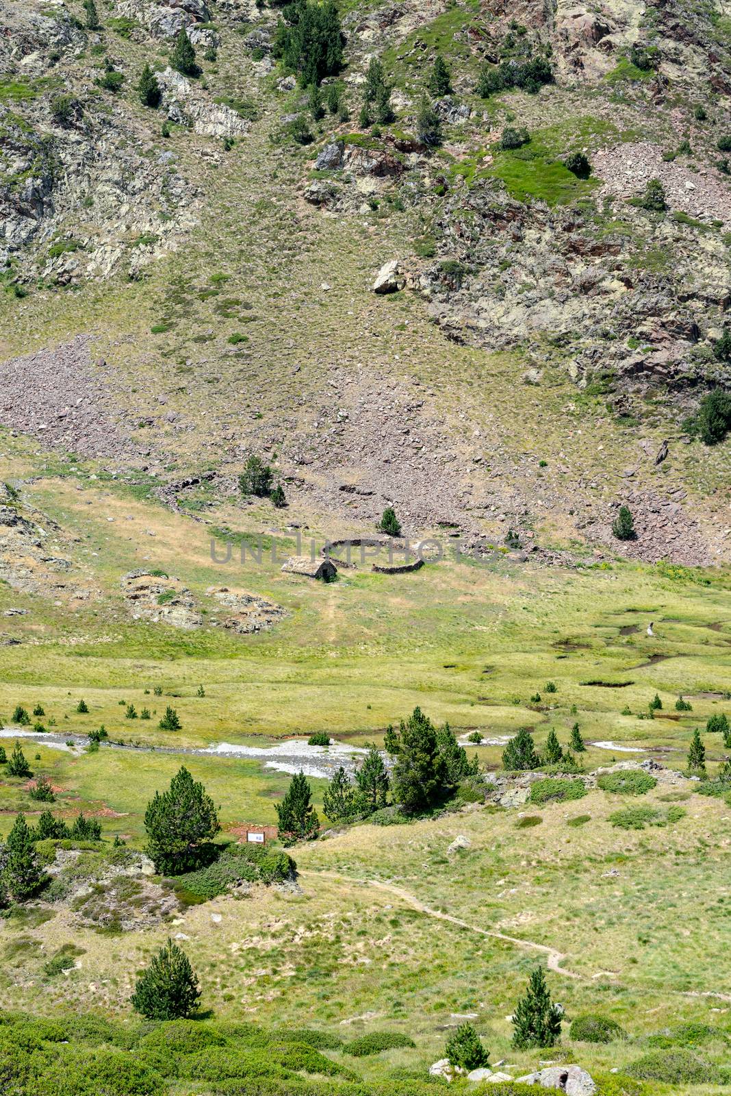 Country house in the Coma Pedrosa Refuge at 2266 meters of altitude in Andorra Pyrenees in summer 2020.