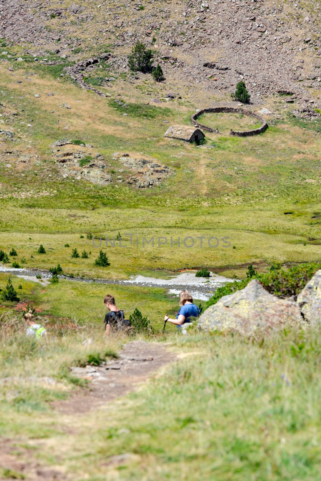 Coma Pedrosa, Andorra : 02 August 2020 : Group of Tourist in Coma Pedrosa refuge at 2266 meters of altitude in Andorra Pyrenees in summer 2020.