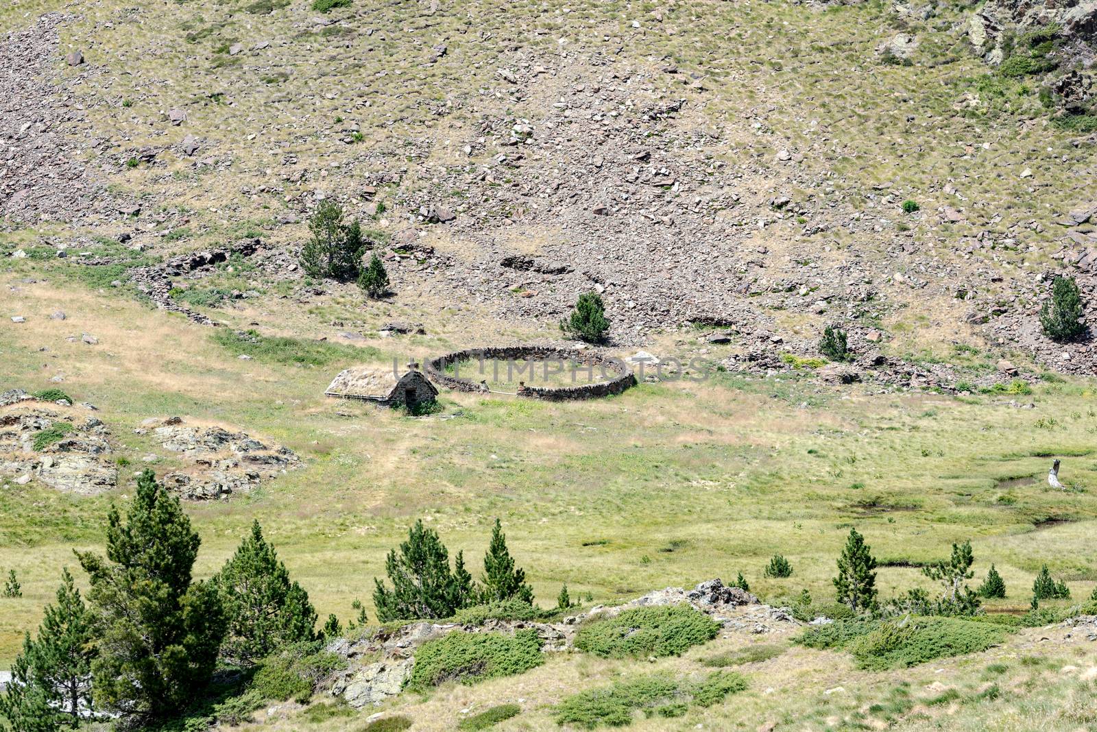 Country house in the Coma Pedrosa Refuge at 2266 meters of altitude in Andorra Pyrenees in summer 2020.