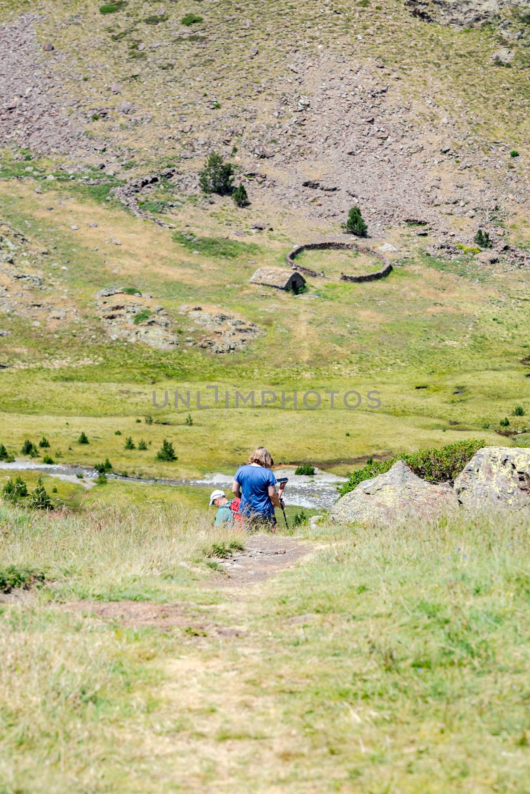 Coma Pedrosa, Andorra : 02 August 2020 : Group of Tourist in Coma Pedrosa refuge at 2266 meters of altitude in Andorra Pyrenees in summer 2020.