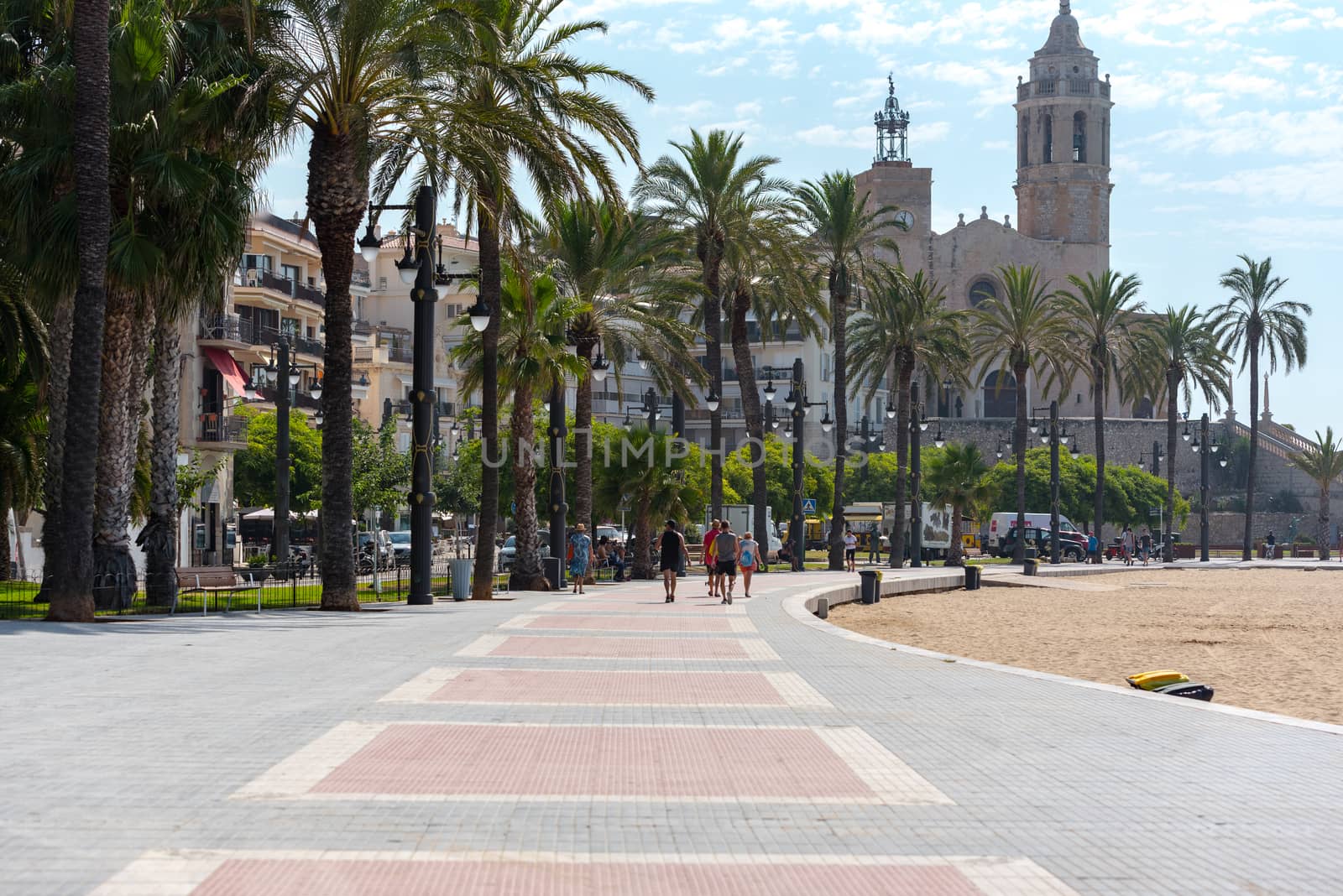 Sitges, Catalonia, Spain: July 28, 2020: People on the Paseo Maritimo in the city of Sitges in the summer of 2020.