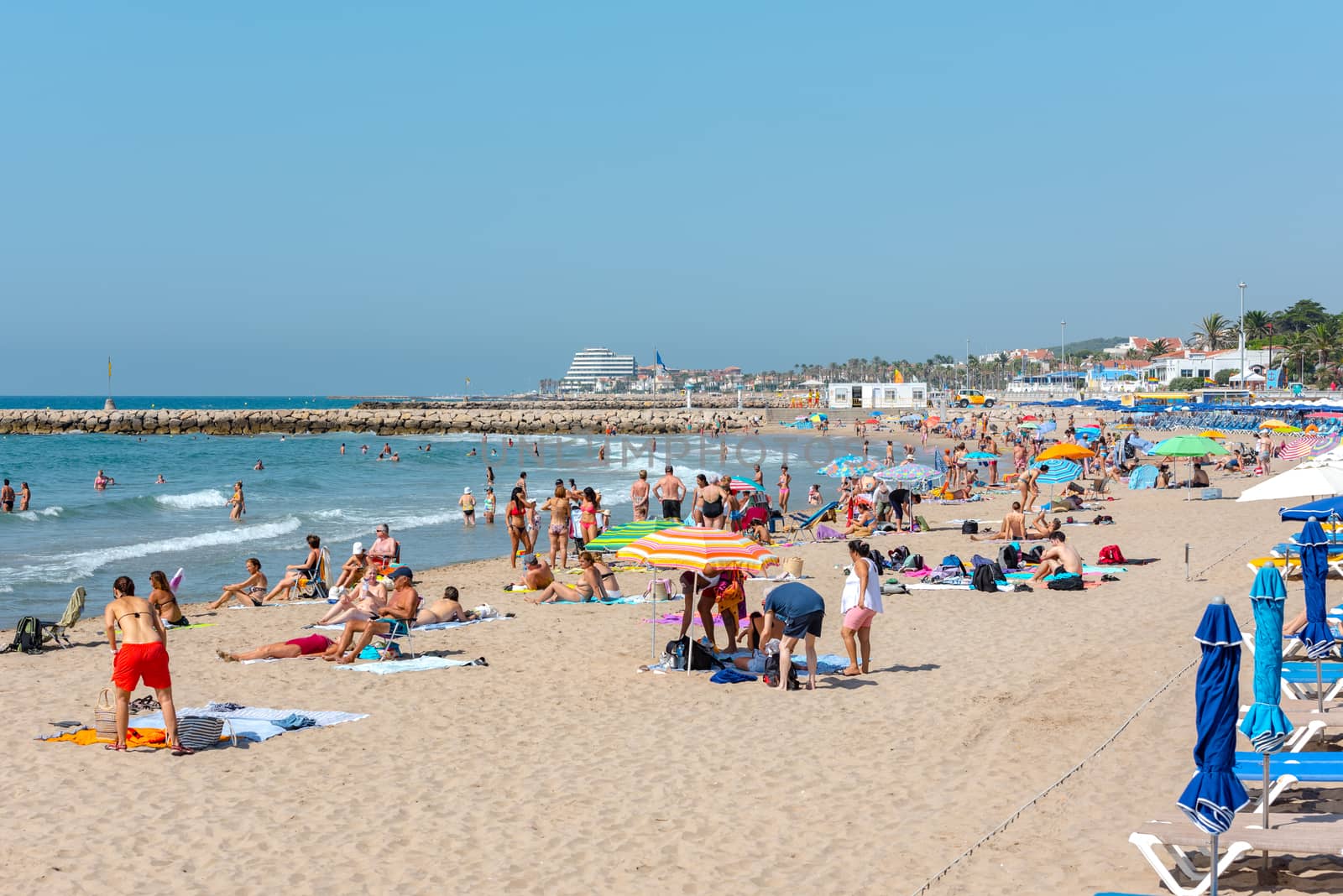 People in the beach in Sitges in summer 2020. by martinscphoto