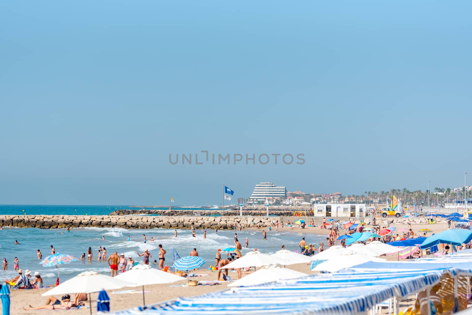 People in the beach in Sitges in summer 2020. by martinscphoto