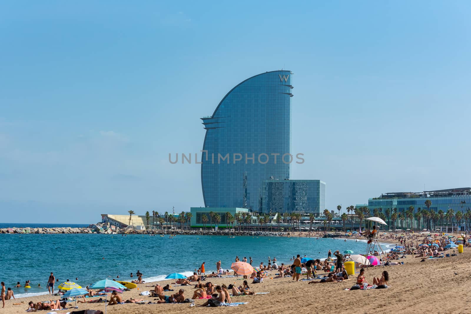 People in the Barceloneta Beach after COVID 19 La Barceloneta in by martinscphoto